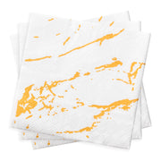 White beverage napkins with a gold marble print, combining functionality and flair for stylish gatherings