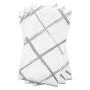 White disposable dinner napkins featuring a stylish silver geometric diamond design, ideal for formal and festive events