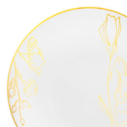 White plastic dinner plates featuring a gold antique floral pattern