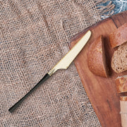 a sleek and modern touch Gold with Black Handle Moderno Disposable Plastic Dinner Knives for holiday or celebration tables