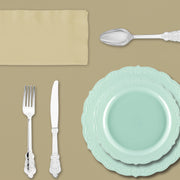 top view of a beautifully arranged Sweet Pea Baby Shower table in soft turquoise and ivory tones